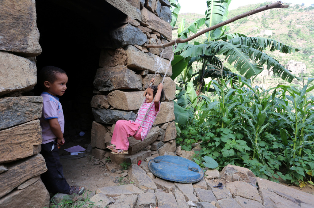 A girl plays on a swing near her house in the mountains, in the Jafariya district of the western province of Raymah, Yemen June 3, 2016. Reuters Photo/Abduljabbar Zeyad