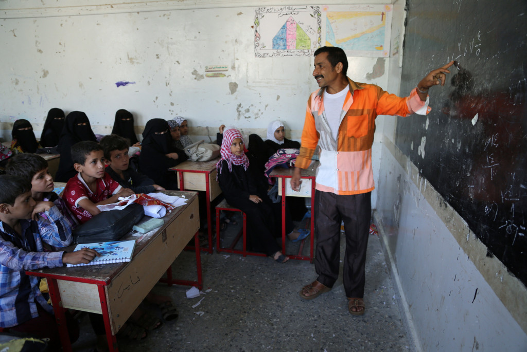A teacher explains a subject to pupils in a school in the mountains, in the Jafariya district of the western province of Raymah, Yemen May 21, 2016. Reuters Photo/Abduljabbar Zeyad