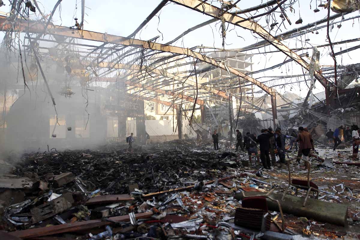 A picture taken on October 8, 2016 shows a general view of the destruction following reported airstrikes on a funeral hall by Saudi-led coalition air-planes on a building in the capital Sanaa.