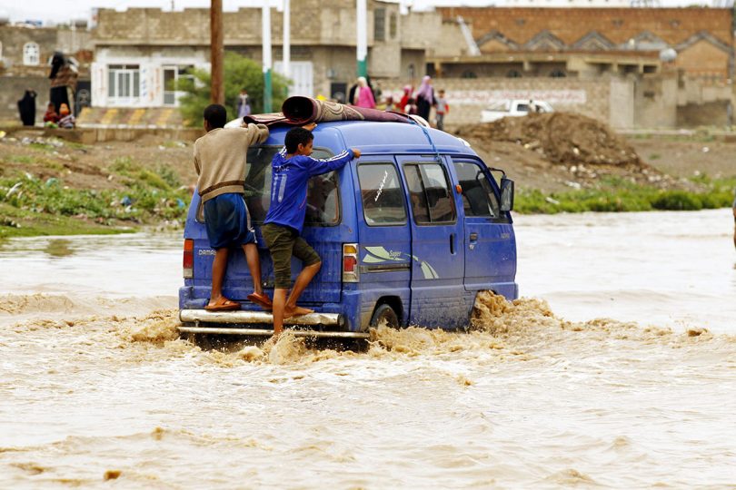 Torrential rain hit Sanaa and most parts of Yemen as summer temperatures soar. [Yahya Arhab/EPA]